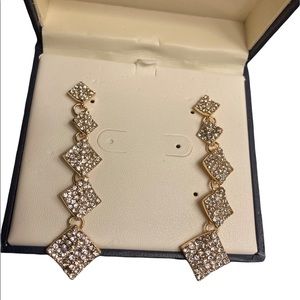 NWOT Dazzling cz with gold long earrings!